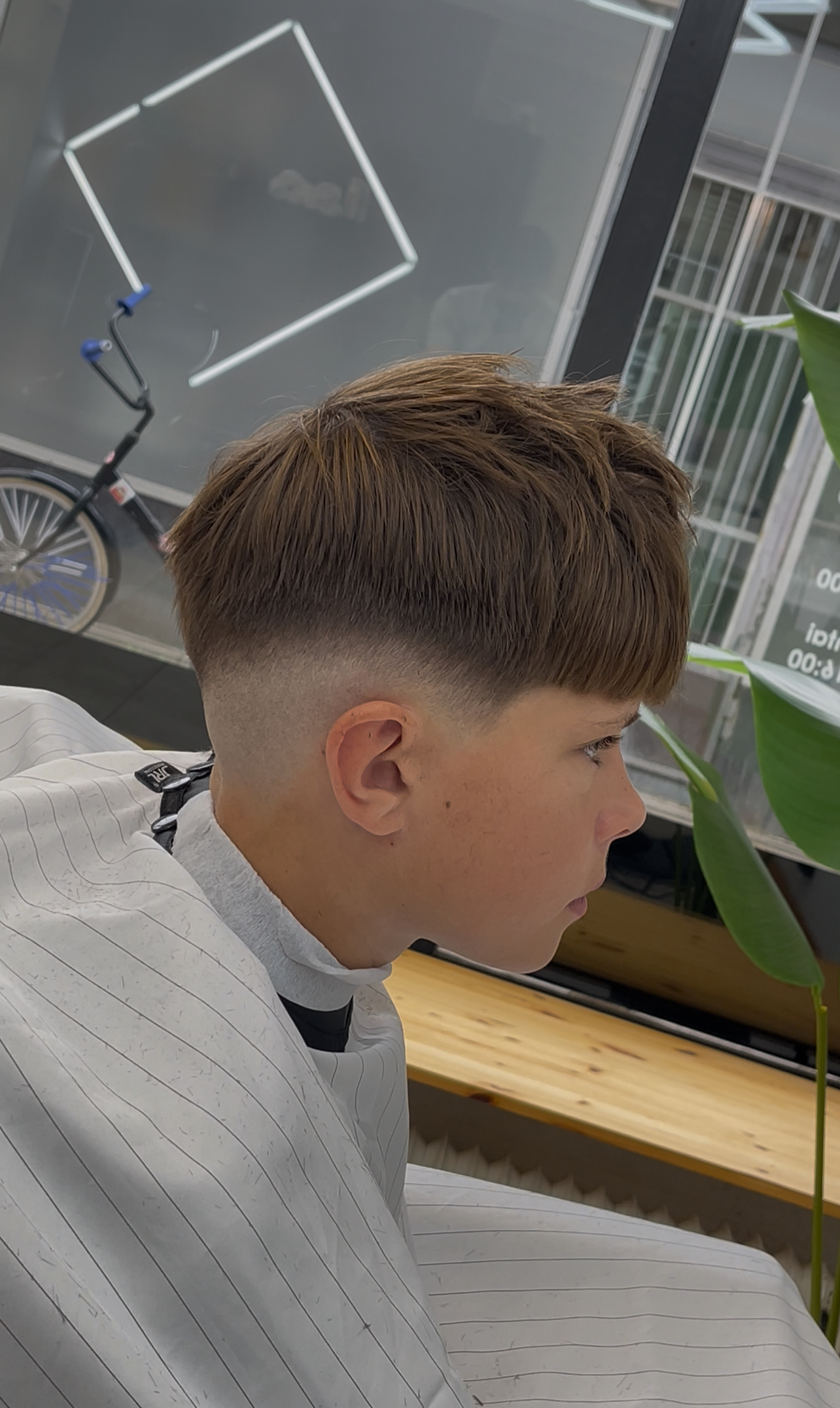 Tidy mid fade haircut